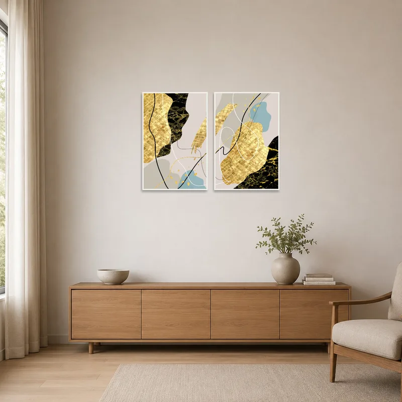 Abstract gold and black art complementing a minimalist room's clean lines and simple furnishings.