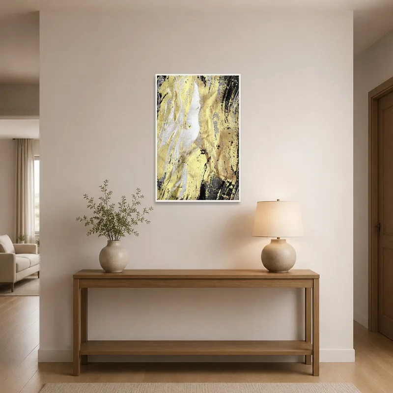 Gold and black textured artwork displayed in a stylish entrance hall.