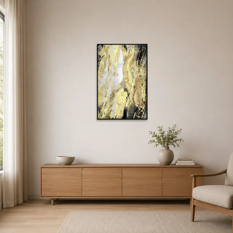 Abstract gold and black artwork accentuating a minimalist style room.