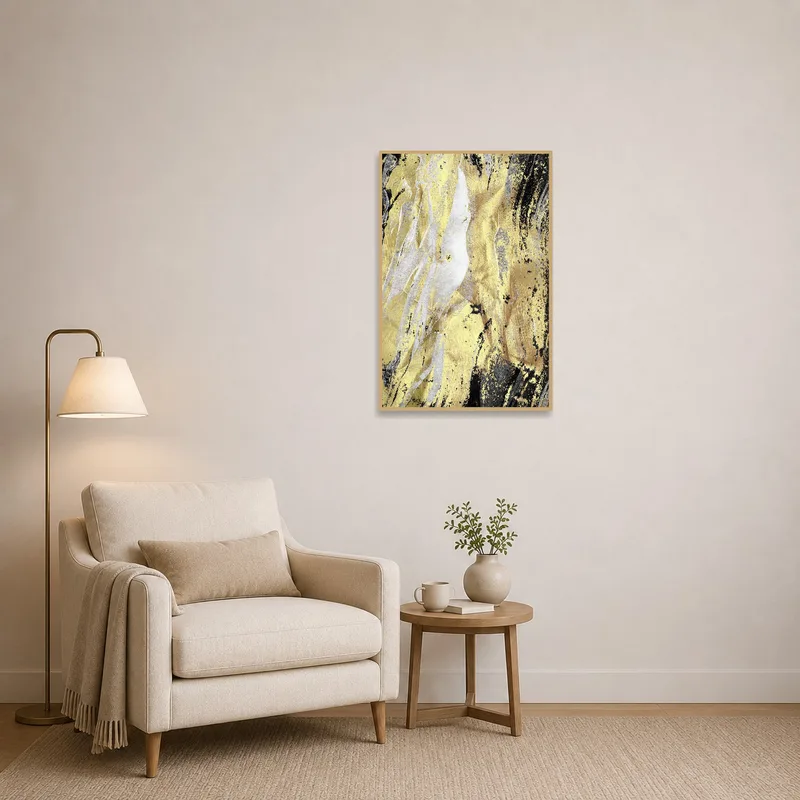 Textured gold and black artwork adding intrigue to a cozy reading corner.