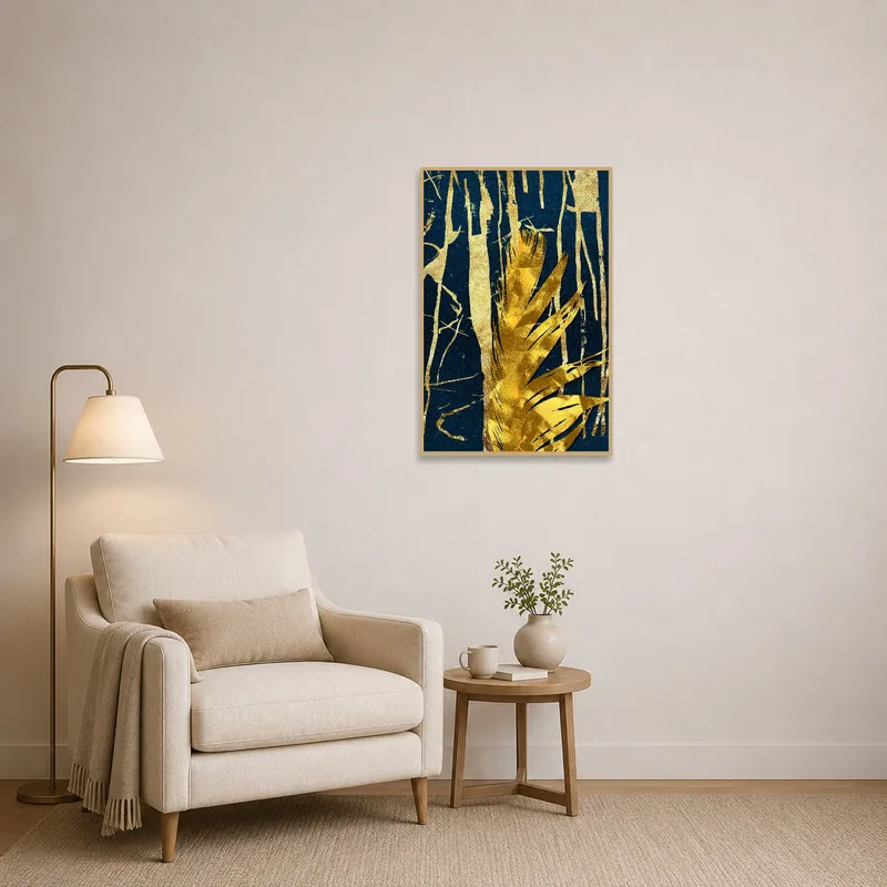 Gold and blue textured artwork enhances the ambiance of a reading corner.