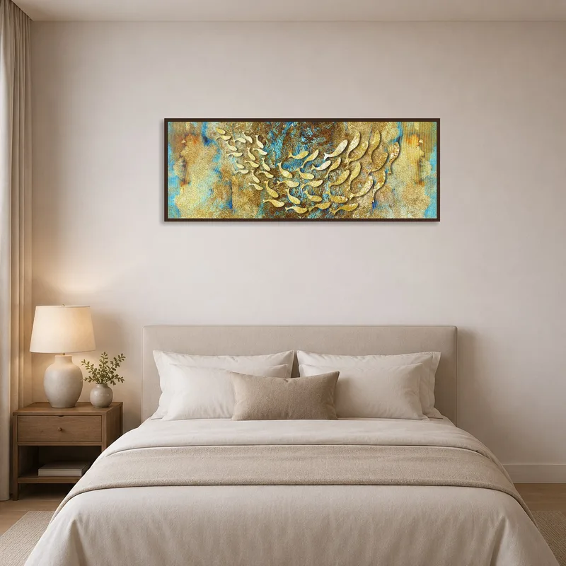 Gold and blue textured art adding tranquility to the bedroom wall.