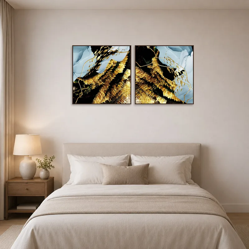 Abstract gold and blue pieces create a serene bedroom ambiance.