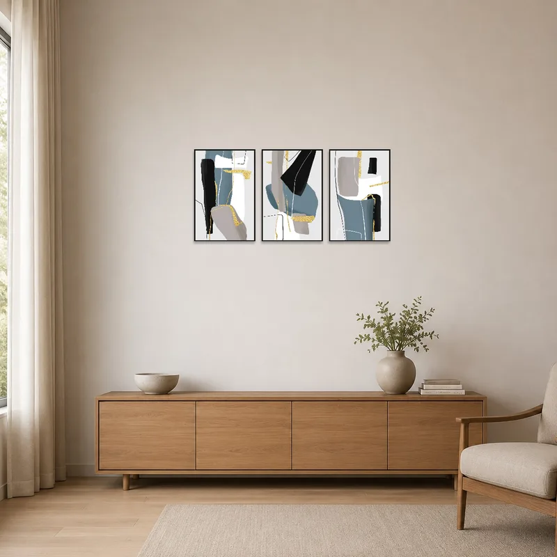 Minimalist room with a striking gold and blue abstract triptych display.
