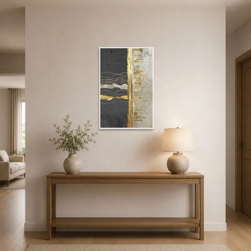 Entrance hall showcasing gold and charcoal abstract art.
