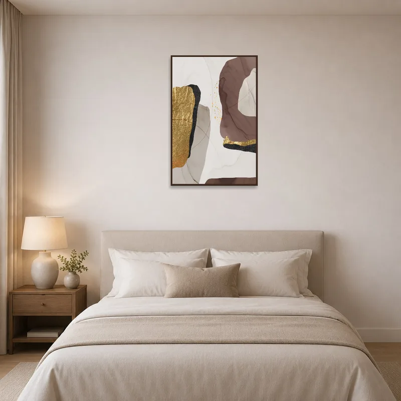 Bedroom wall enhanced by an abstract art piece with gold and earthy tones.