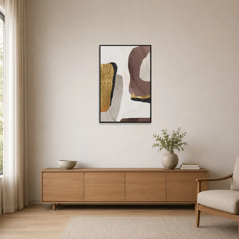 Minimalist room showcasing abstract art in gold and earthy shades as the focal point.
