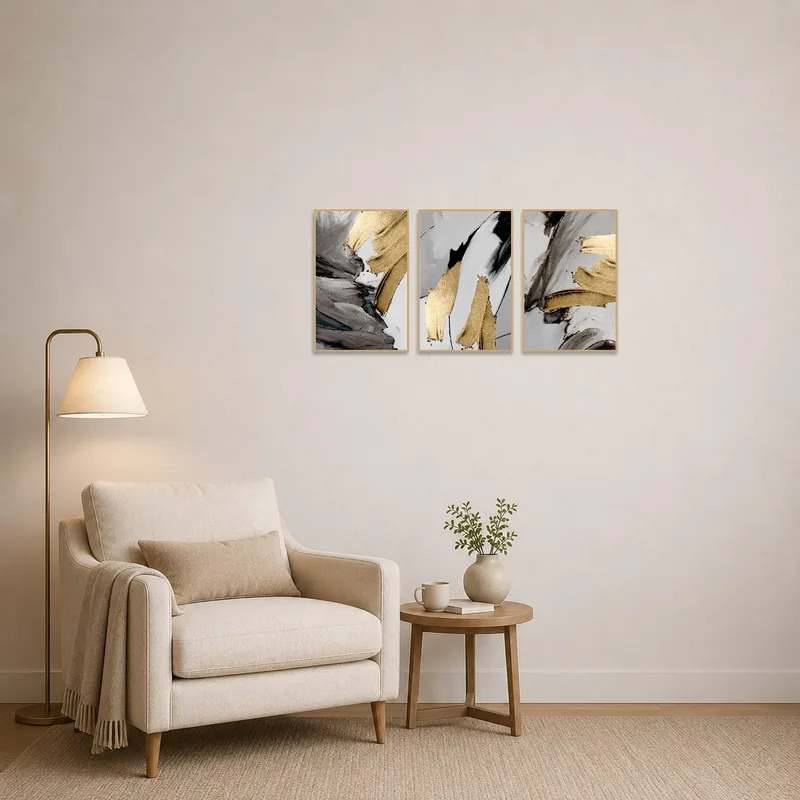 A cozy reading-corner enhanced by abstract brushstrokes in gold and gray tones.