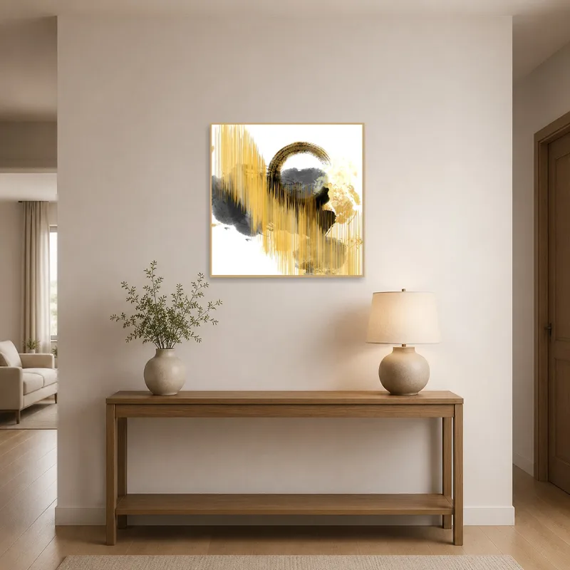 Sophisticated entrance hall featuring gold and gray circle art.