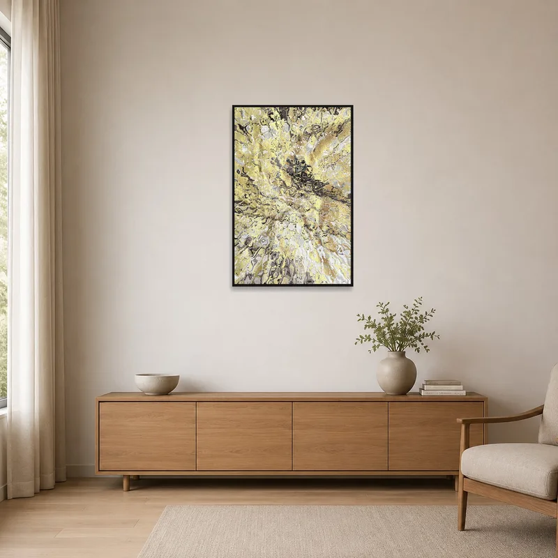 Gold and gray textured artwork complements a minimalist room with sleek furnishings.