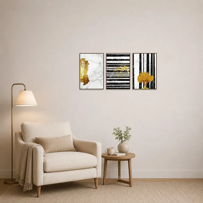 Stylish gold and marble triptych adds warmth to a cozy reading corner.