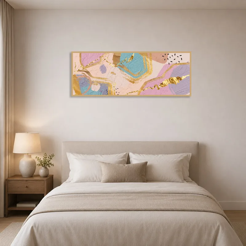 Abstract gold and pastel art print above a bed in a serene bedroom setting.
