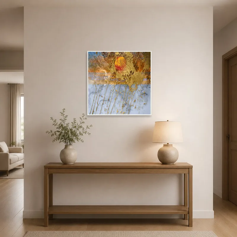 Artwork with gold and sunset hues enhancing the entrance hall.