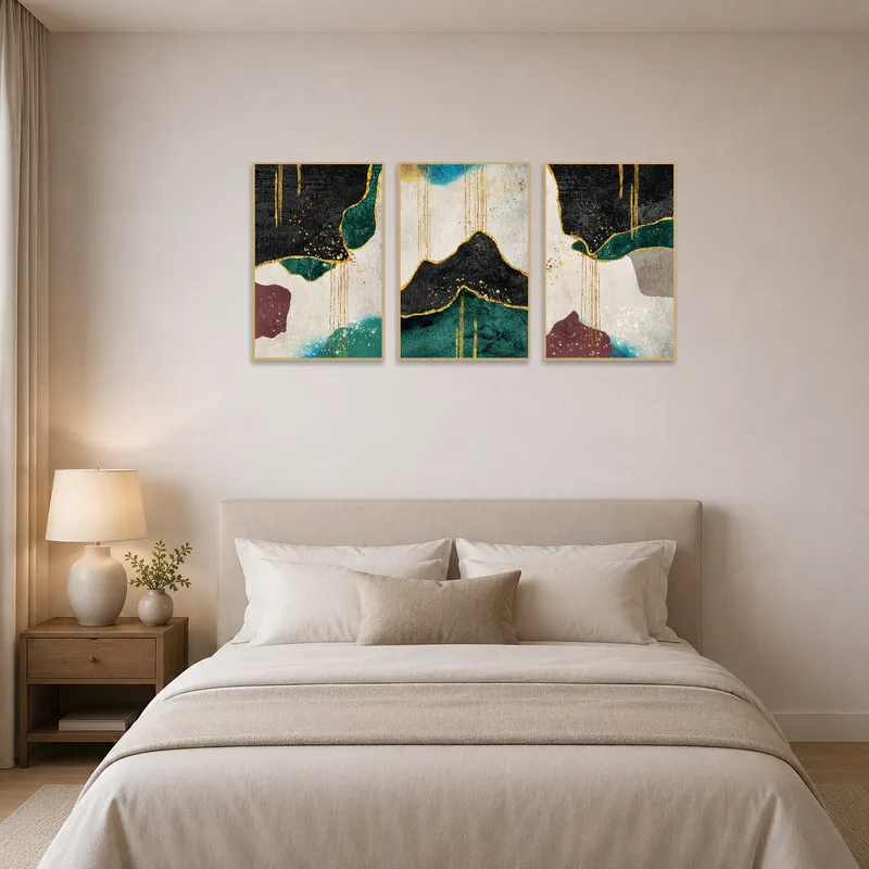 Abstract gold and teal paintings enhance the serene ambiance of the bedroom.