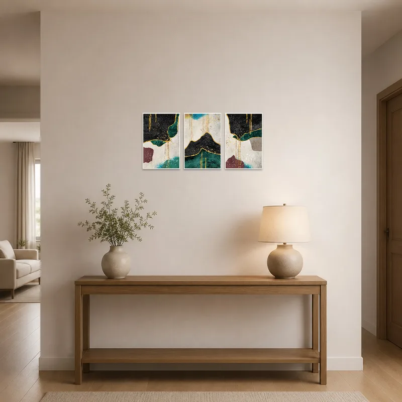 Teal and gold hues greet guests in the entrance hall with sophistication.