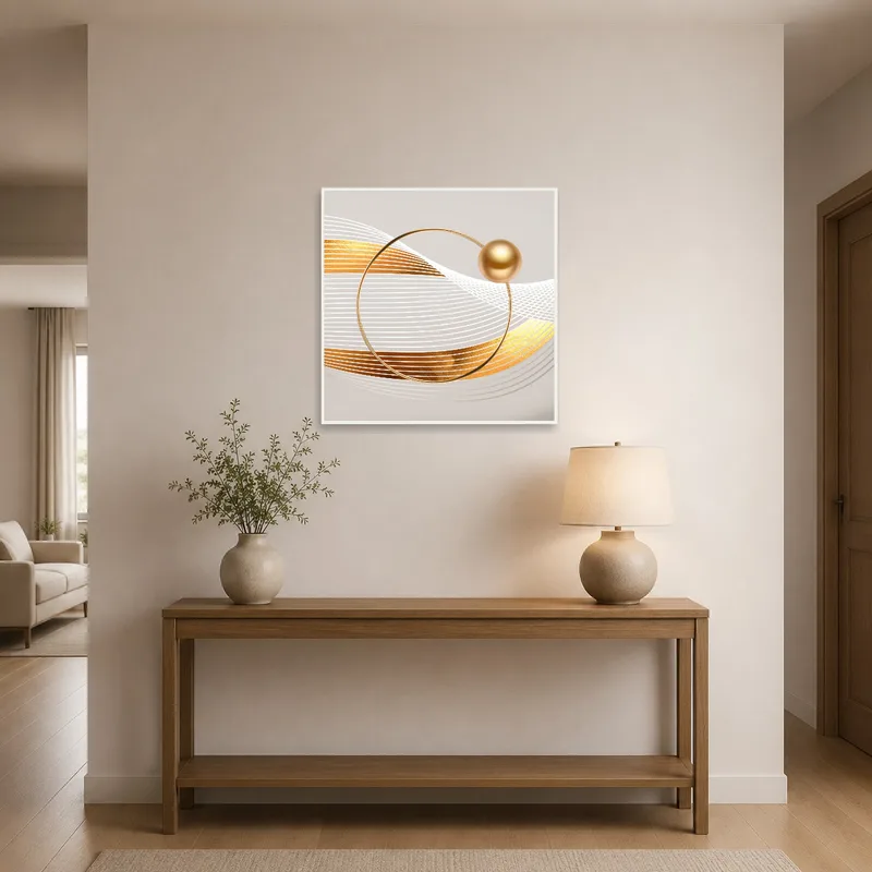 Geometric art in gold and white adding elegance to an entrance hall ambiance.