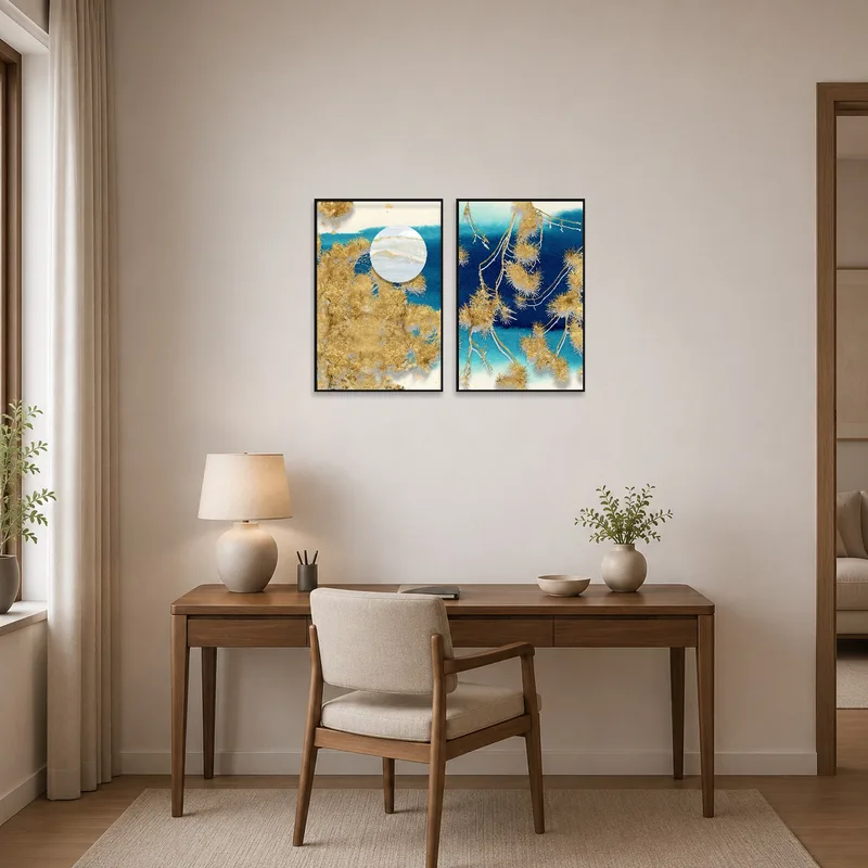 Abstract gold botanical art highlights a chic home-office setup.