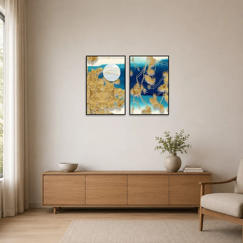 Minimalist room showcases gold botanical art on a plain wall.