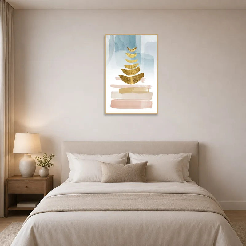 Bedroom wall displaying a soothing abstract gold and watercolor piece.