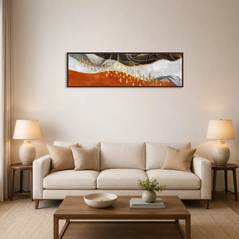Abstract golden birds wall art hangs above a sleek modern sofa in the living room.