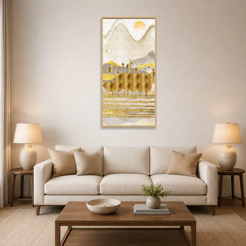 Abstract golden landscape with sun hanging on living room wall above a modern sofa.
