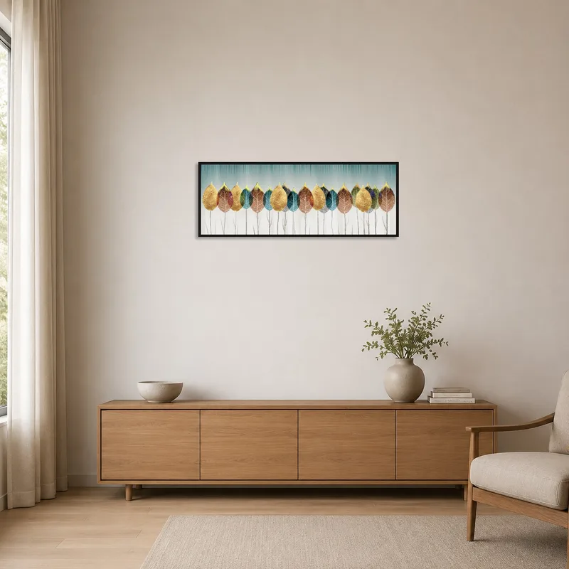 Golden leaf art accentuating a minimalist room scene.