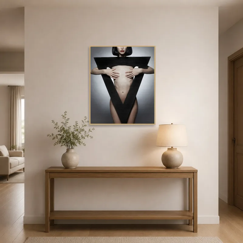 Entrance hall showcasing abstract human form with geometric shape artwork.
