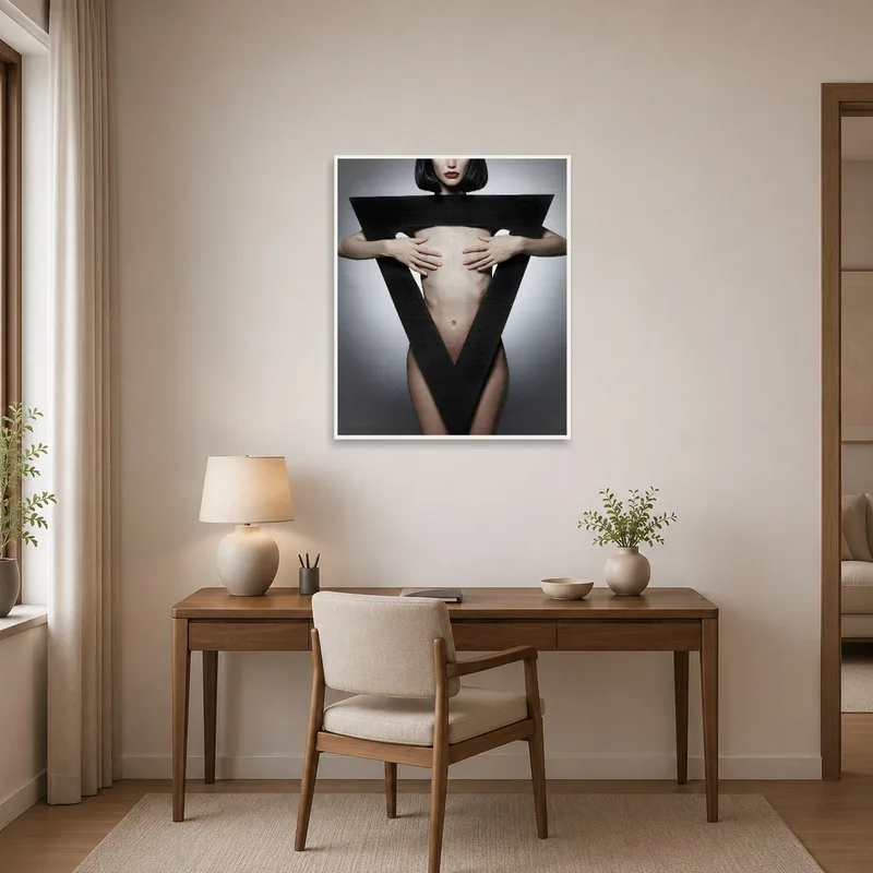 Home office adorned with abstract human form and geometric shape themed artwork.