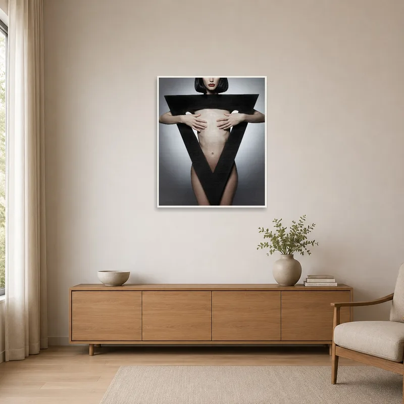 Minimalist room featuring abstract human form with geometric shape wall art.