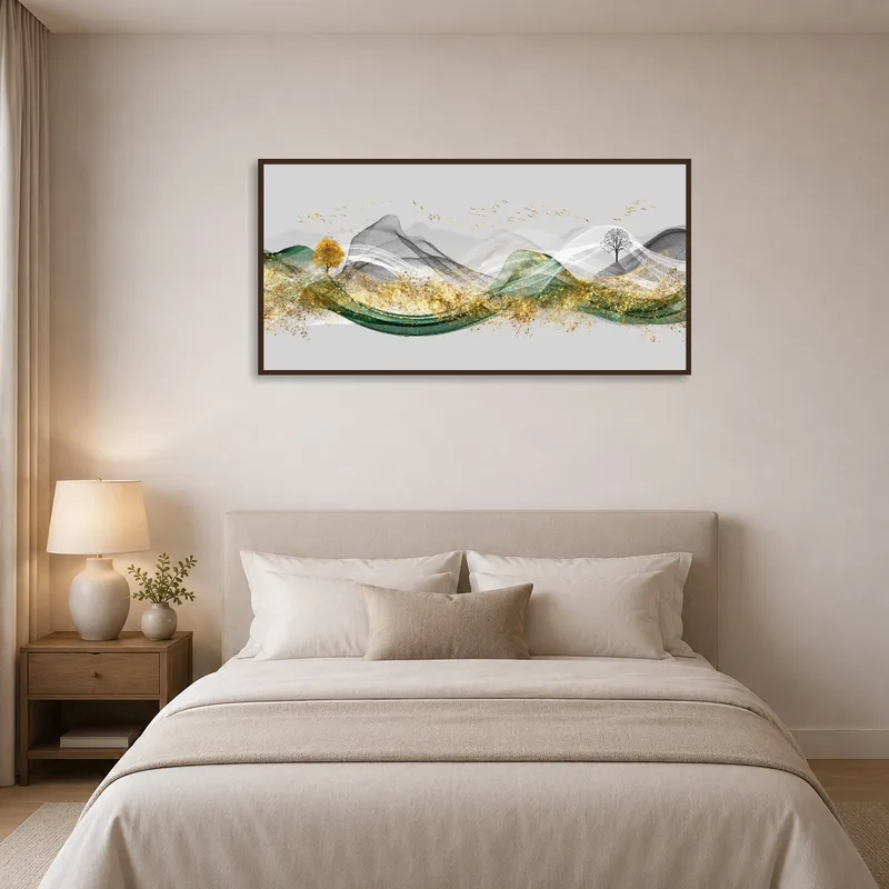 Abstract art with gold and trees creates a serene vibe in a bedroom.
