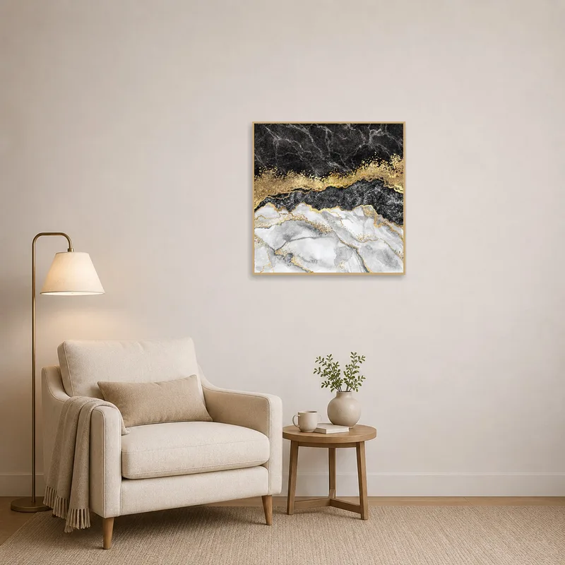 Reading corner adorned with an abstract marble art print laced with gold.
