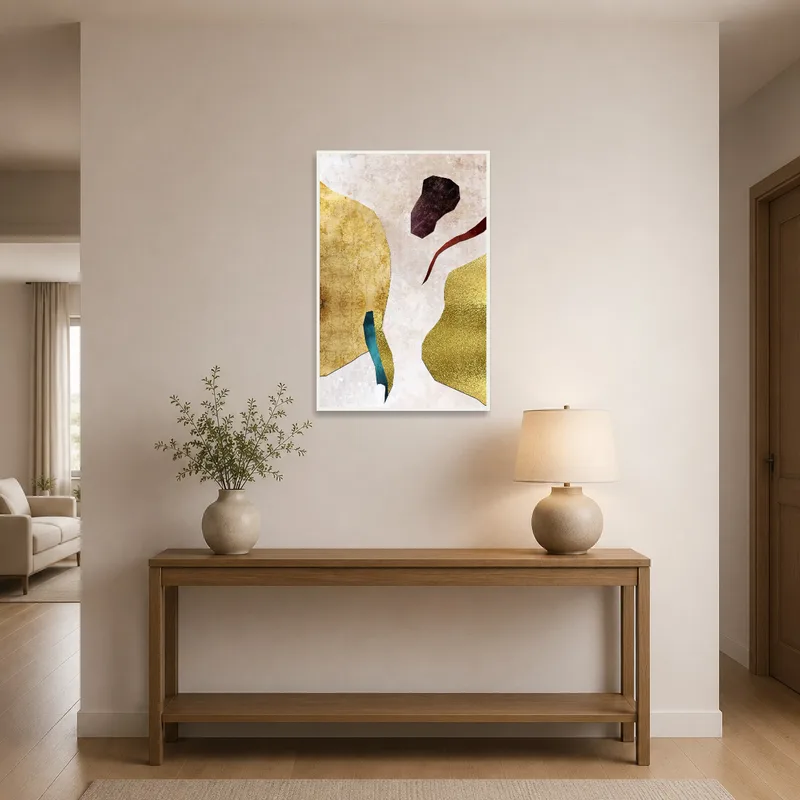 Abstract metallic collage in earthy tones adding warmth to an entrance hall with sleek flooring.