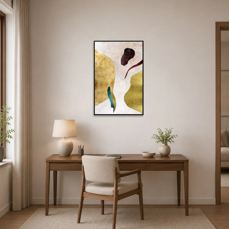 Abstract metallic collage in earthy tones complementing a home office setup with a modern desk.