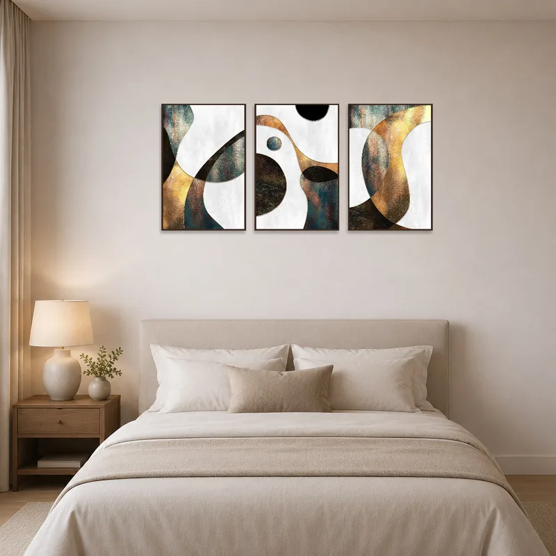 Abstract metallic geometric set hung above a bed in a serene bedroom setting.