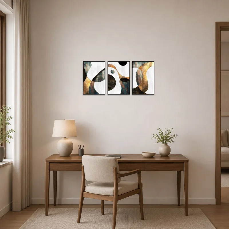 Sophisticated geometric triptych set on the wall of a sleek home office.