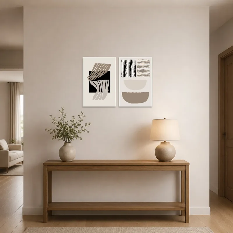 Geometric diptych set adding a chic touch to the entrance hall backdrop.