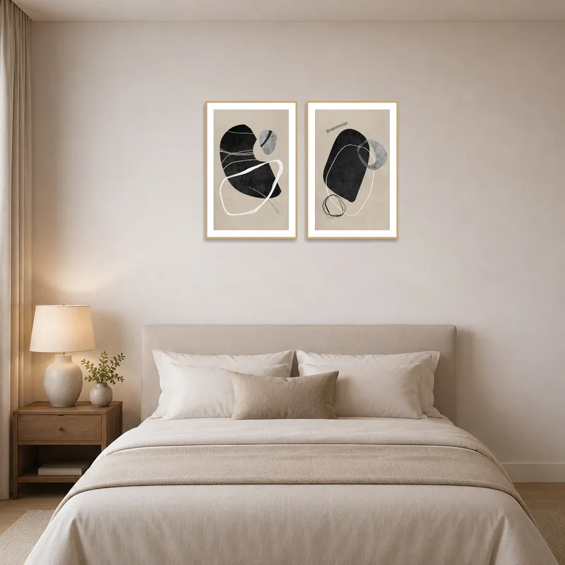 Abstract forms enhance the serene ambiance of a modern bedroom wall.