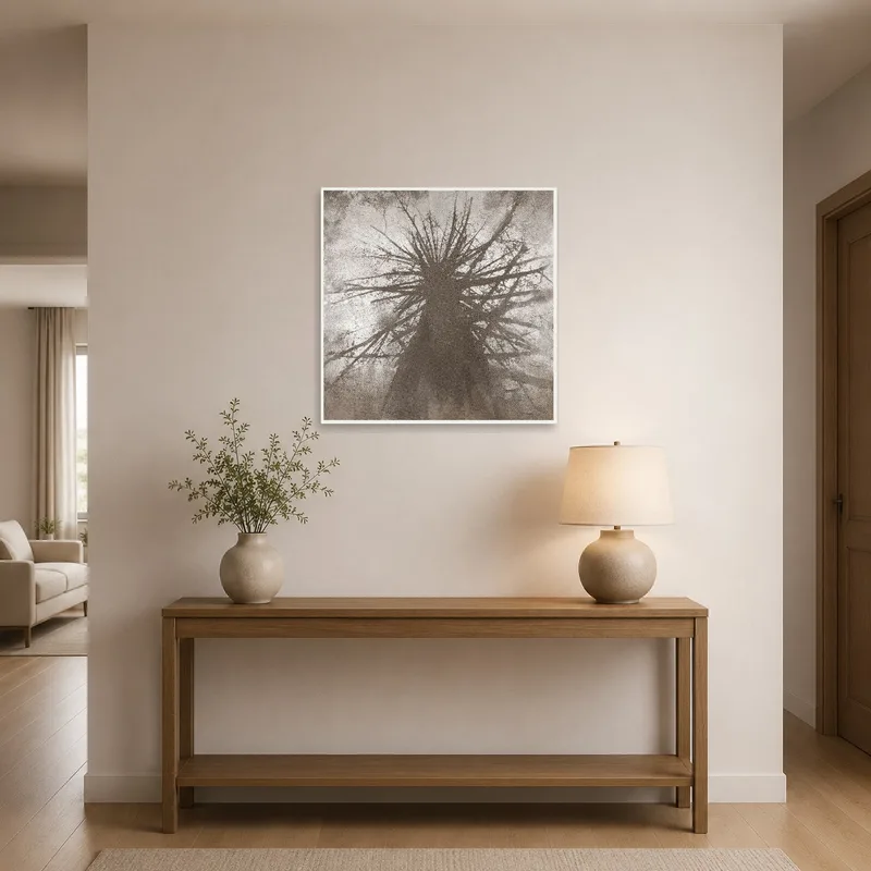 Tree silhouette art adds elegance to a bright entrance hall.