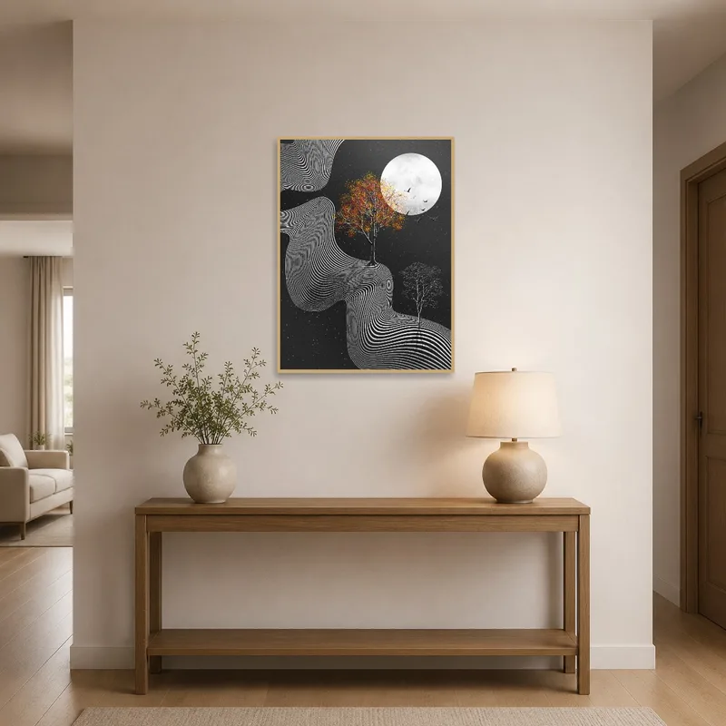 Entrance hall adorned with abstract moonlit landscape art near a console table.