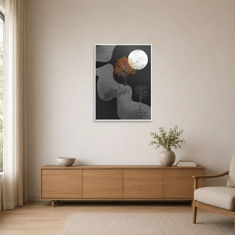 Minimalist room with abstract moonlit landscape art on a clean white wall.