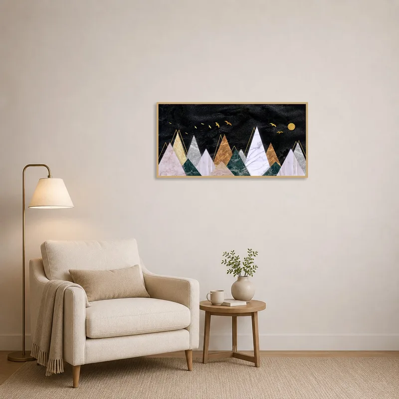 Abstract mountain range with golden birds print adding elegance to a cozy reading corner.
