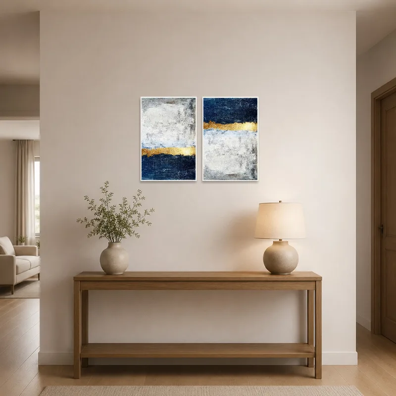 Blue and gold art greets guests in an elegant entrance hall.