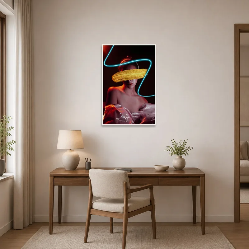Bold neon portrait with gold accents enhances a home office.