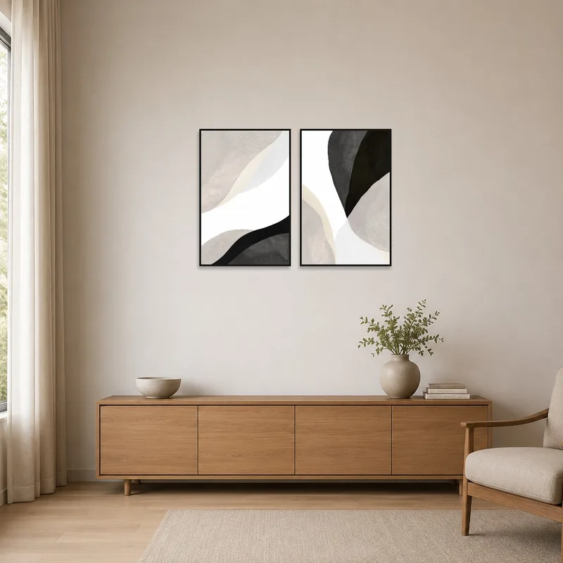 Neutral toned abstract prints in a minimalist room.