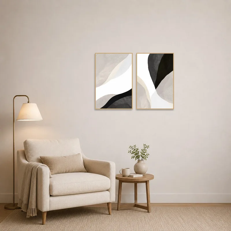 Set of abstract prints near a cozy reading corner.
