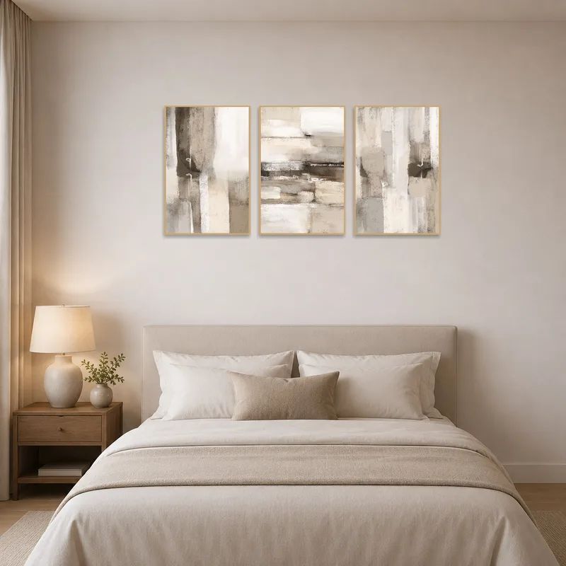 Serene bedroom atmosphere complemented by a neutral tones triptych art set.
