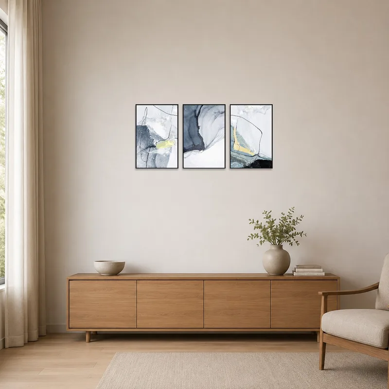 Minimalist room with Abstract Oceanic Flow Triptych Set as the focal point.