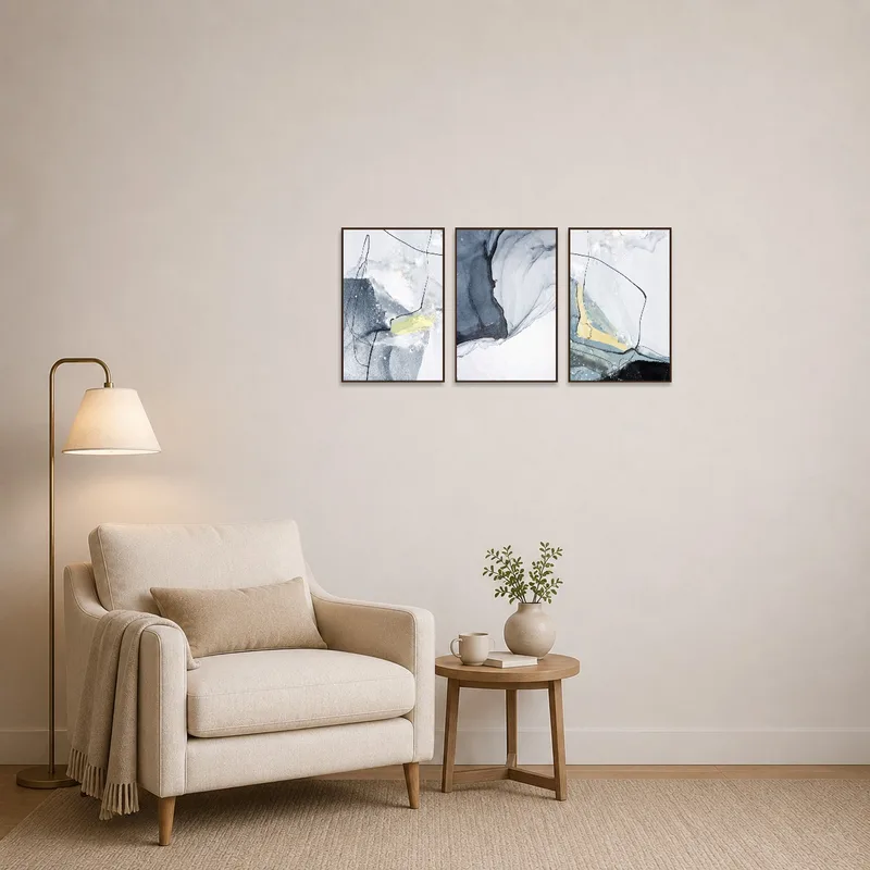 Reading corner featuring Abstract Oceanic Flow Triptych Set for a calming vibe.