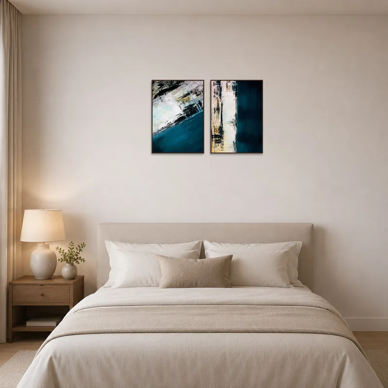 Abstract oceanic artwork set bringing tranquility to a serene bedroom.