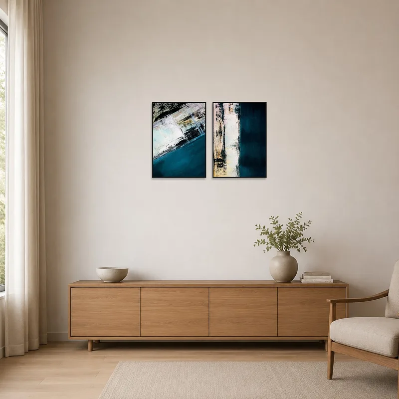 Abstract art set with oceanic hues on a plain white wall in a minimalist space.
